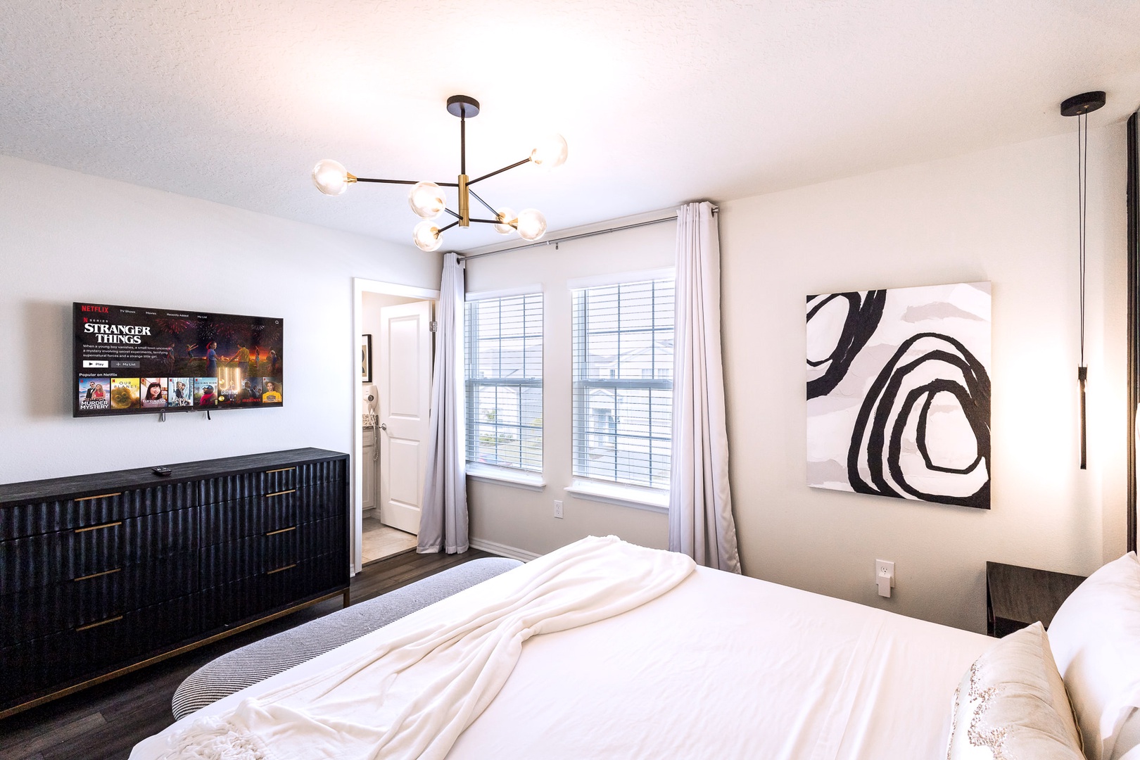 Bedroom 8 with King bed, Smart TV, and en-suite