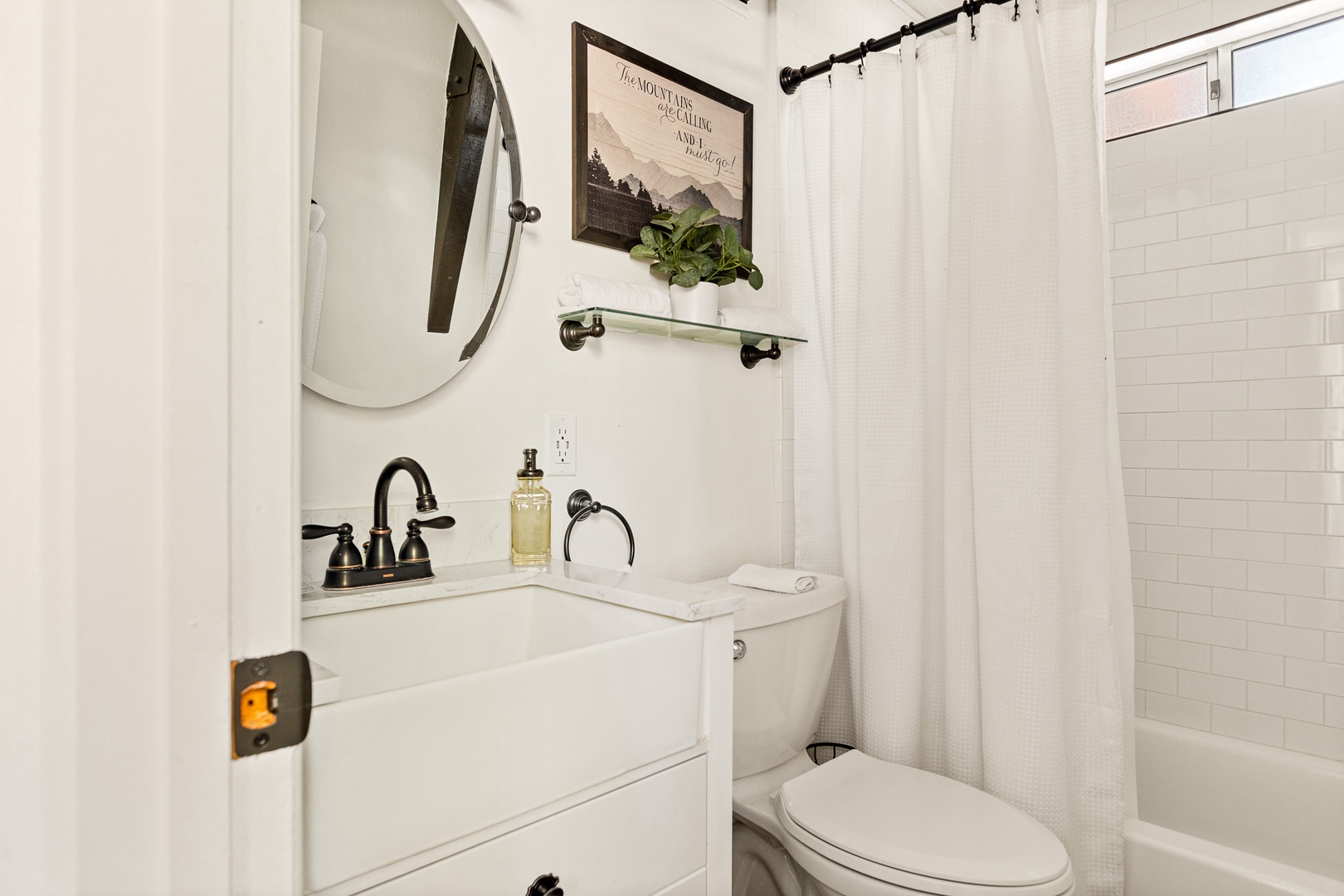 Bathroom with Shower/Tub Combo En-Suite to Bedroom #2