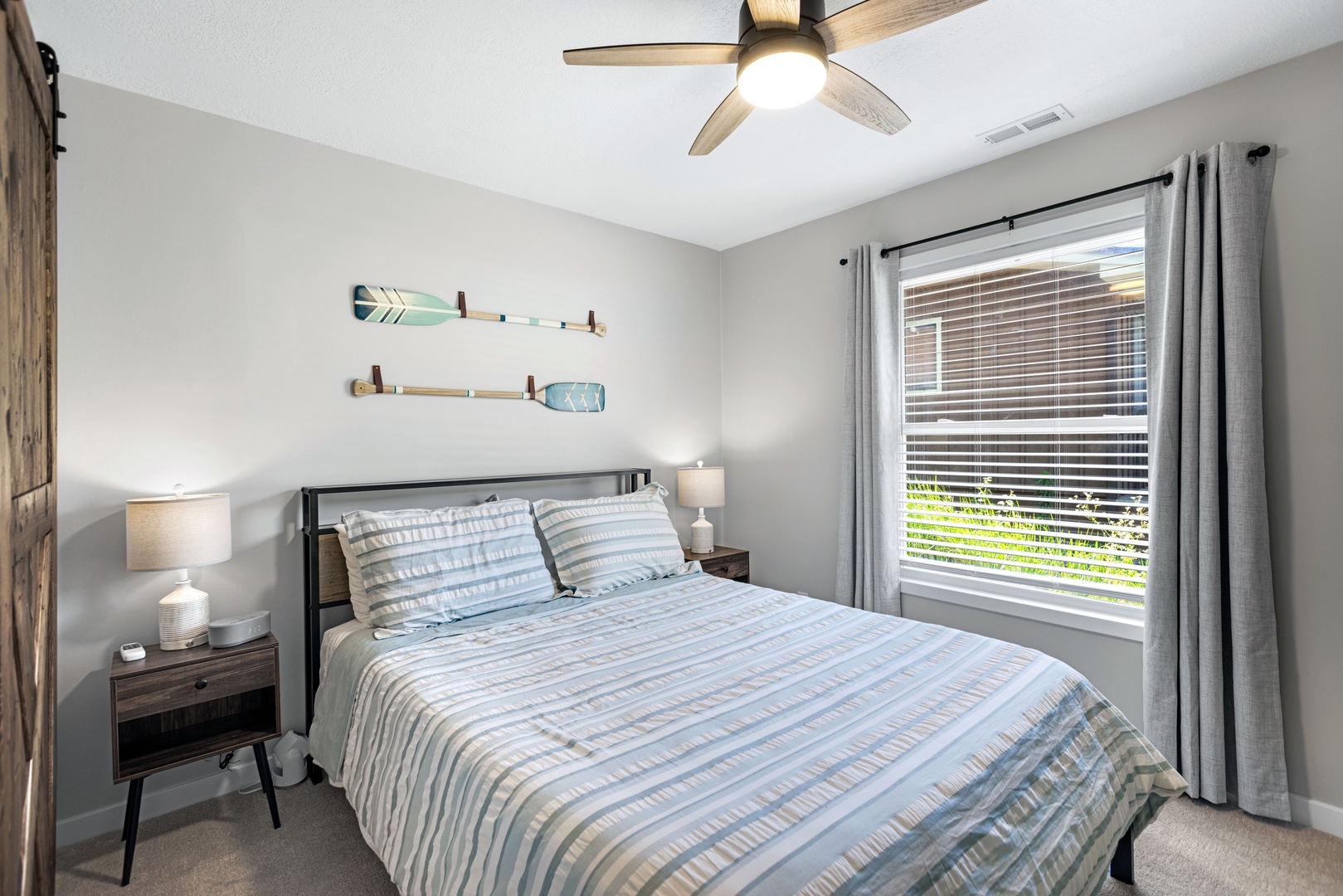 Bedroom 2 with queen bed and Smart TV