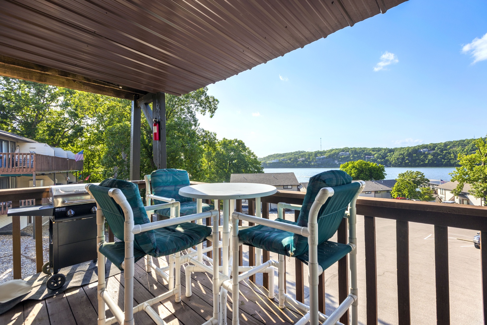 Lounge the day away with gorgeous lake views on the deck with gas grill