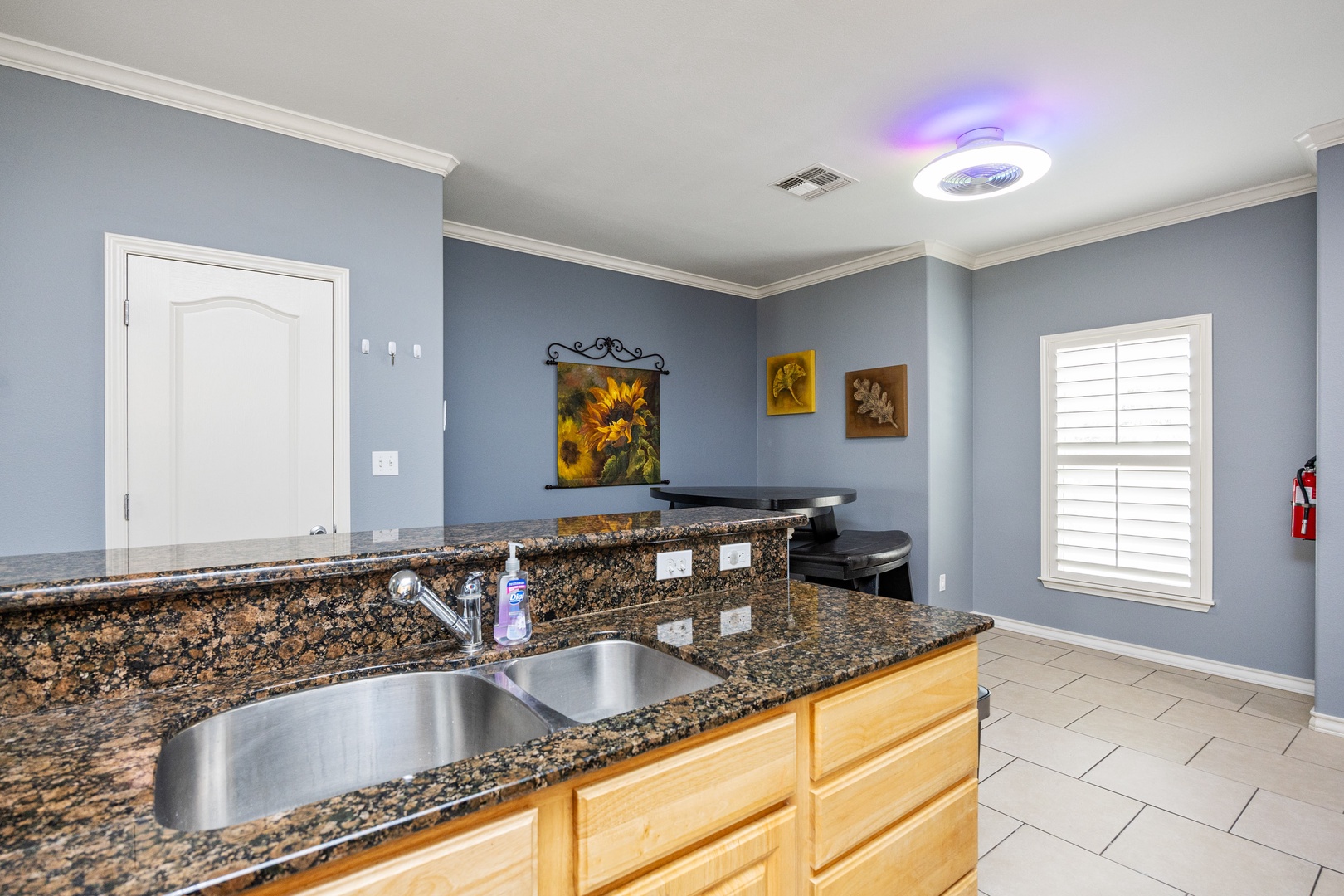 The open, airy kitchen offers ample space & all the comforts of home