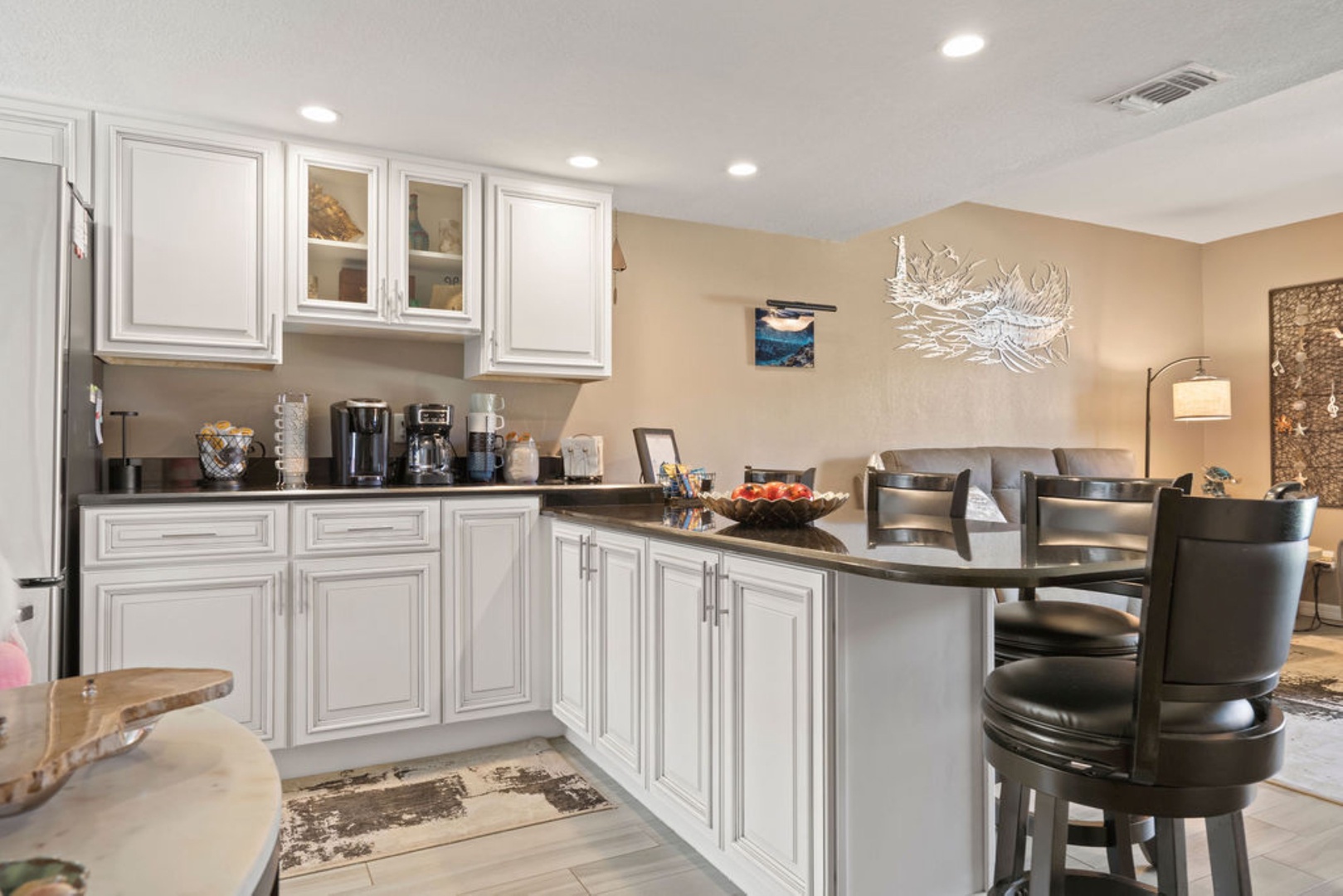 The well-equipped kitchen offers ample storage space & fantastic amenities