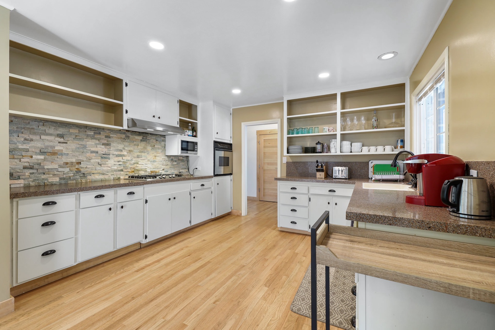 Kitchen is semi-updated with lots of storage!