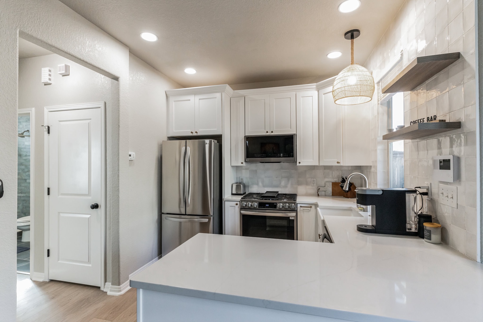 Fully-equipped kitchen featuring sleek stainless steel appliances