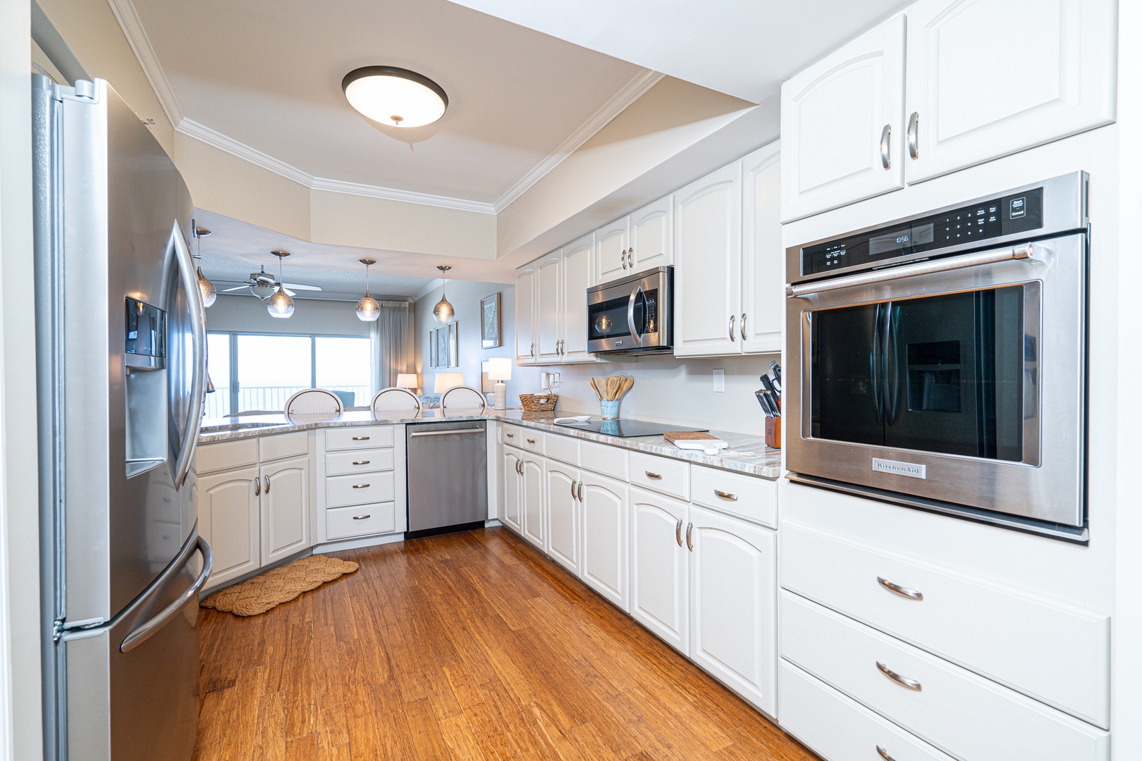 The open, airy kitchen offers ample space & all the comforts of home
