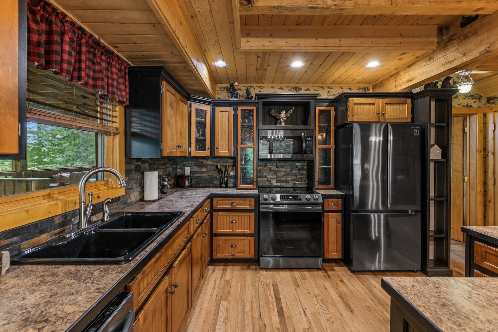 A well-equipped kitchen blending functionality with rustic elegance