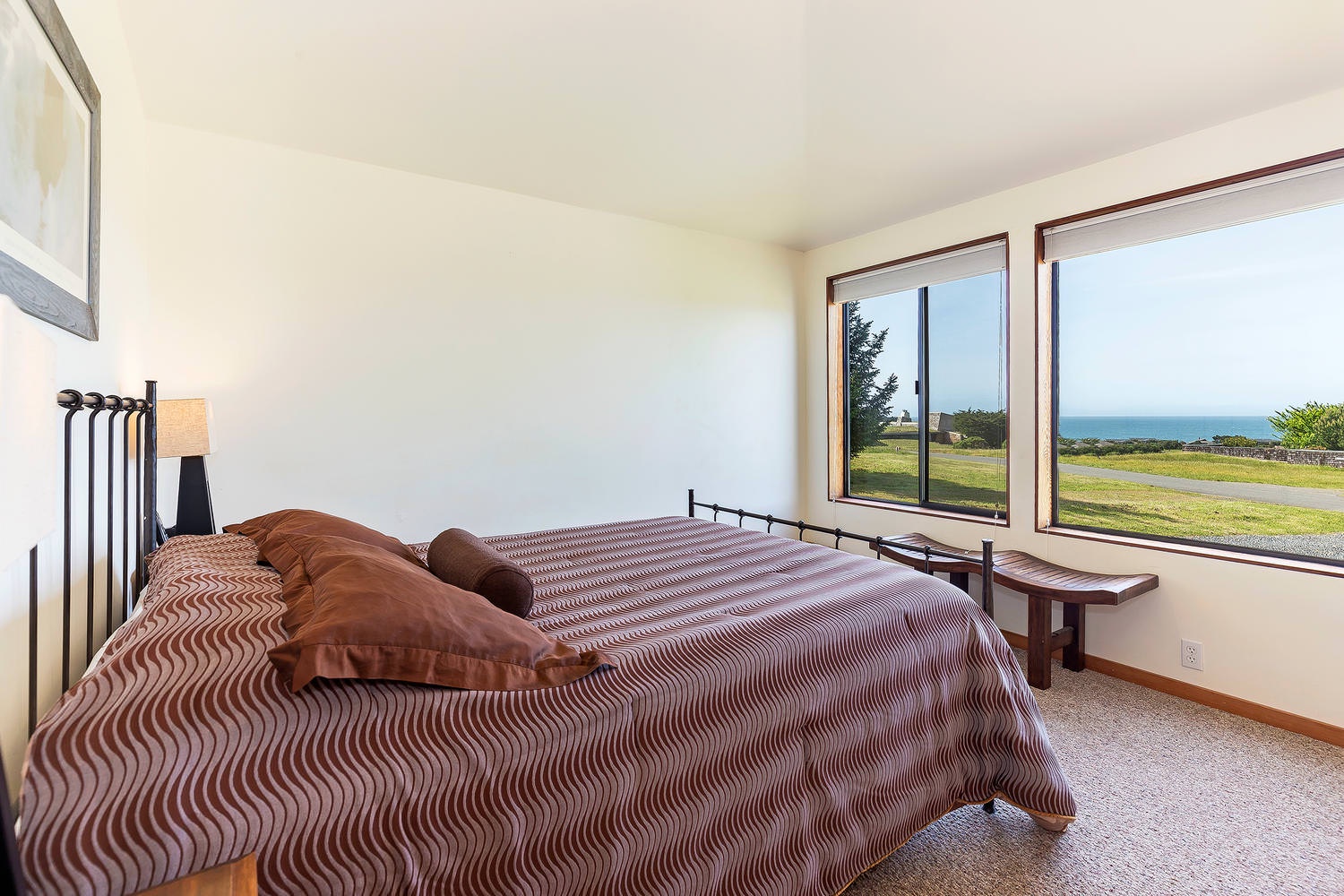 2nd bedroom: Queen bed w/ partial ocean views