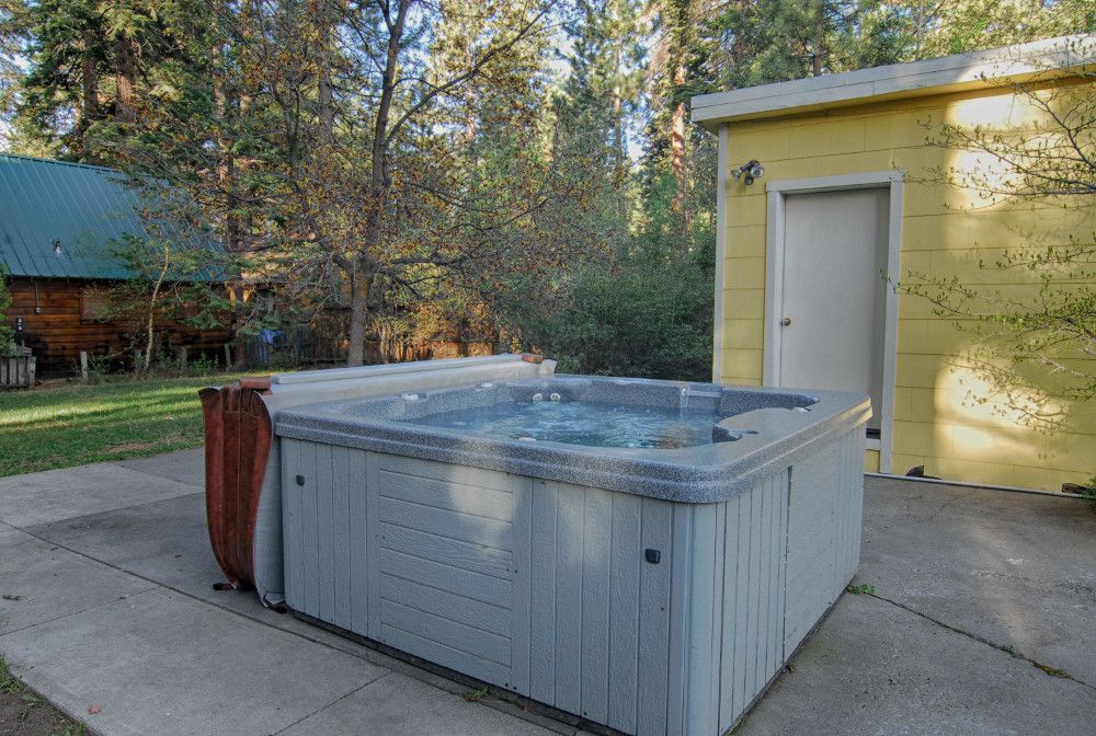 Private hot tub in backyard