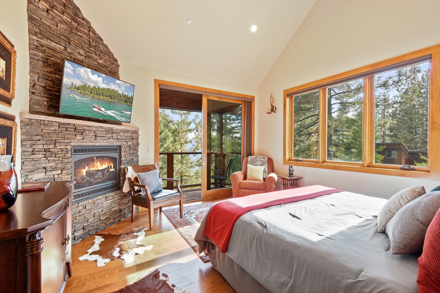 2nd floor master bedroom: King bed with private balcony, Smart TV, gas fireplace