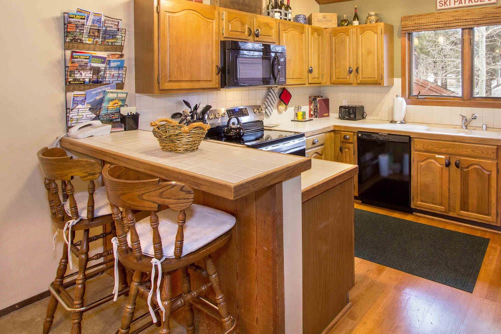 Kitchen w/ slow cooker, waffle maker, coffee maker, toaster, blender, wine chiller and more