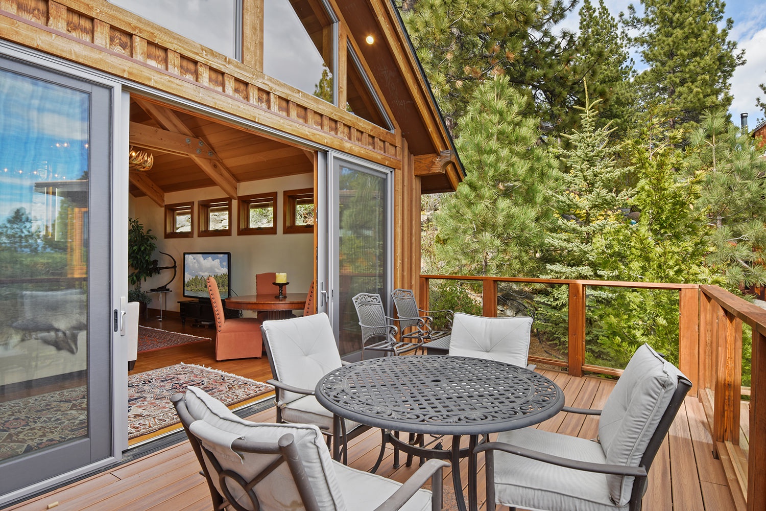 Outdoor deck with gas BBQ grill and outdoor seating