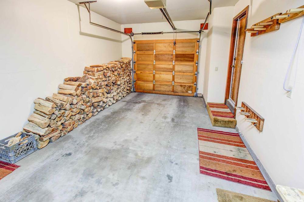 One car garage with firewood