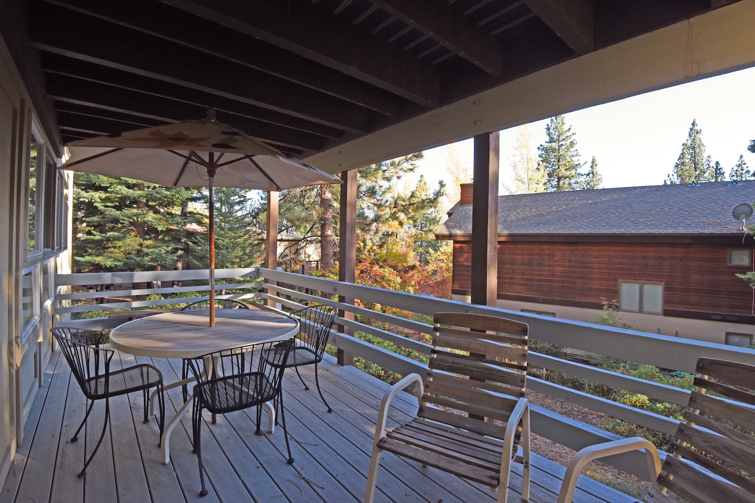 Downstairs deck with patio furniture