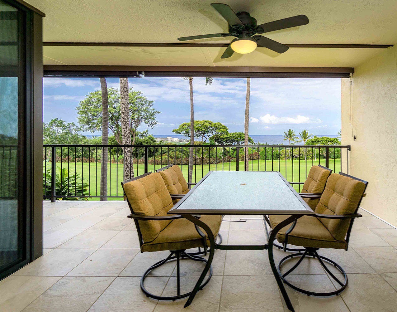 Private lanai with patio table and BBQ grill