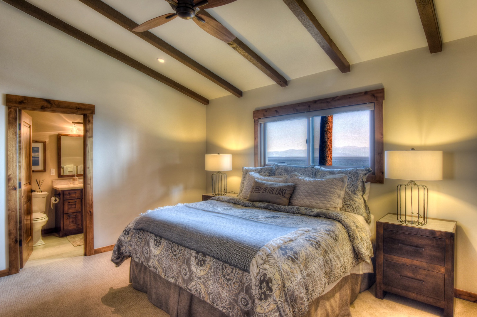 Master bedroom: King bed with lake view