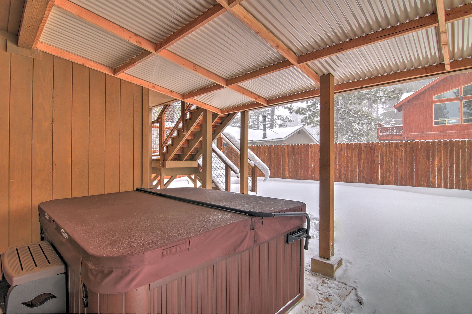 Enjoy a soak in the private outdoor hot tub