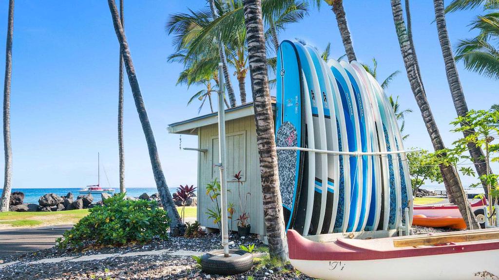 Surfboard and kayak rentals shack by private beach
