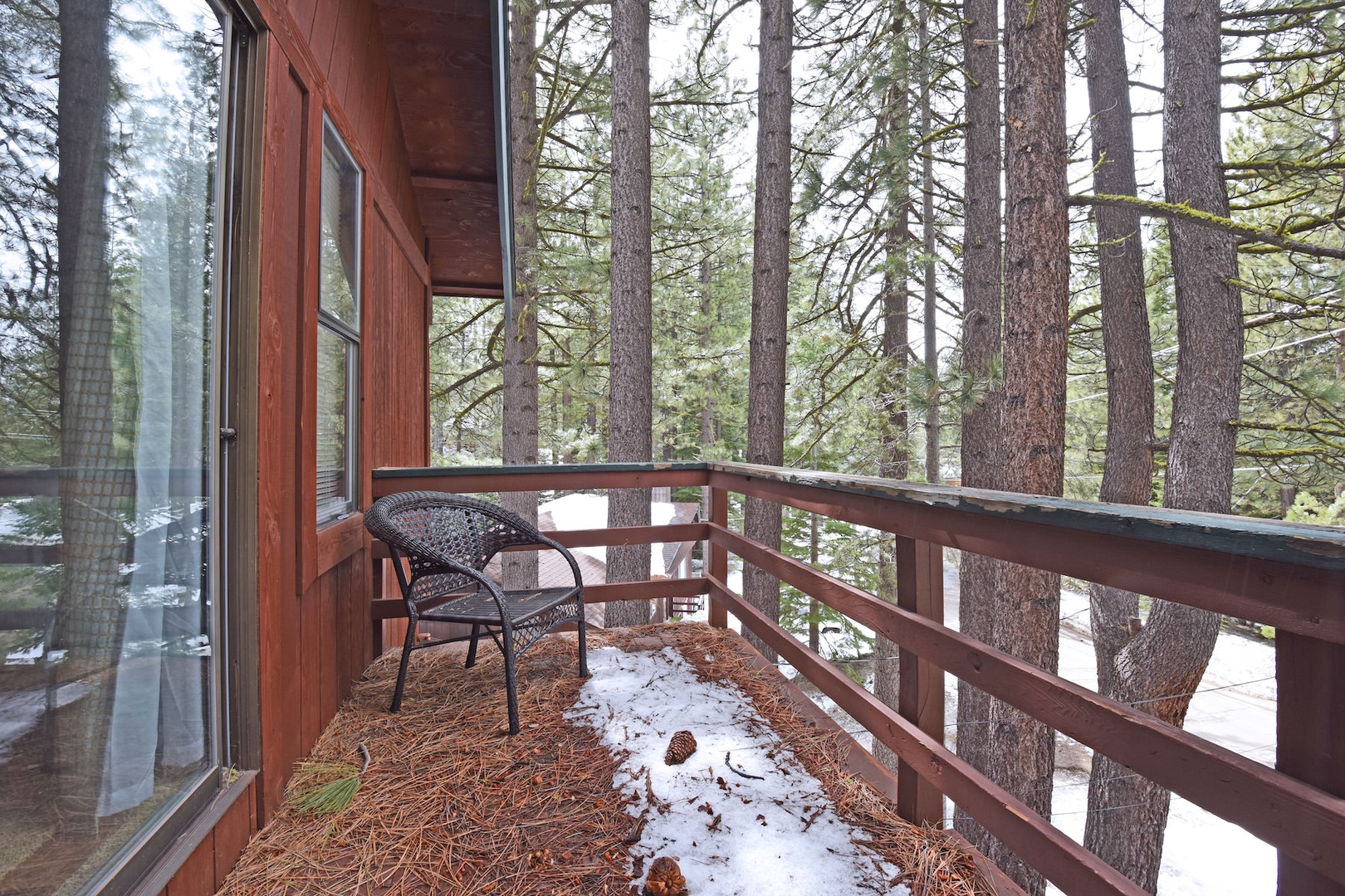 Master bedroom balcony with forest view. Note* - the deck is closed from guest use for repair.*