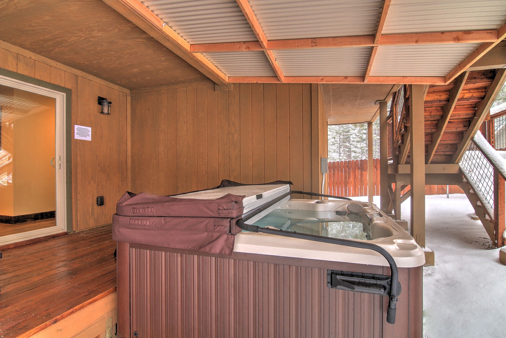 Enjoy a soak in the private outdoor hot tub