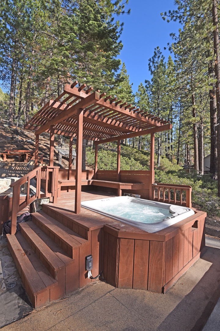 Take a soak in the private outdoor hot tub