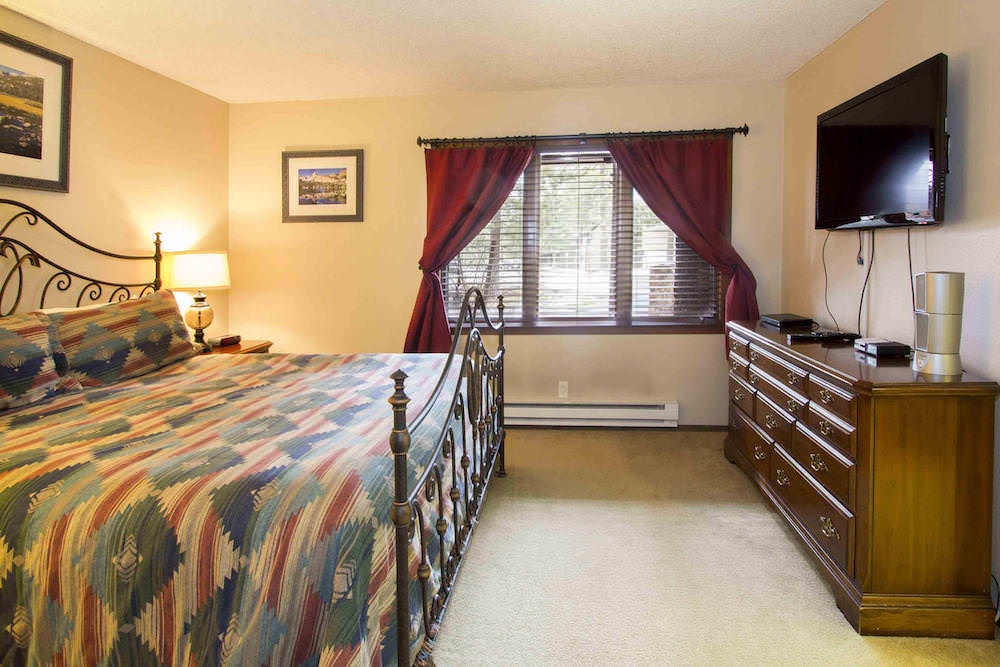 Master bedroom: King bed w/ TV