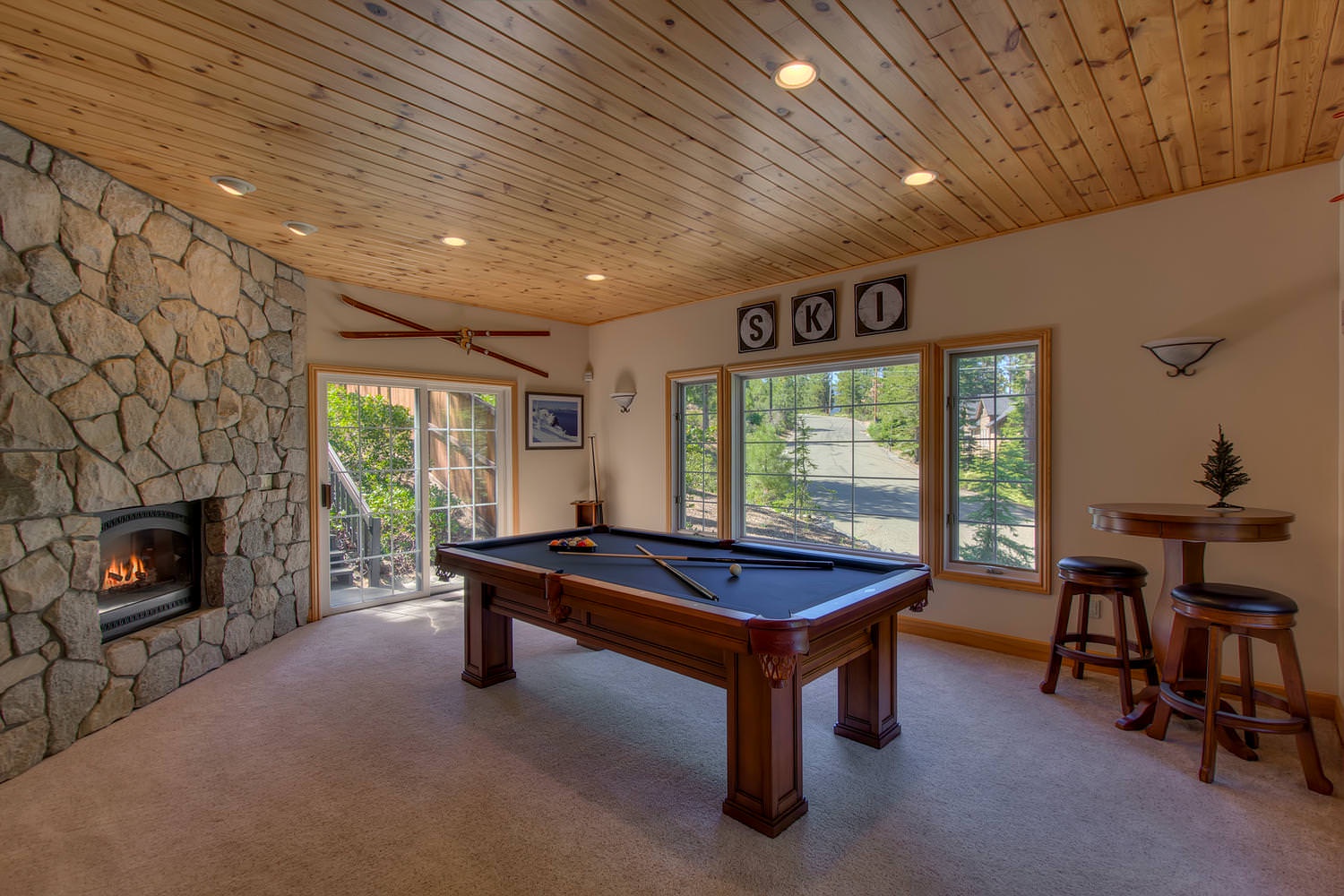 Downstairs game room with pool table