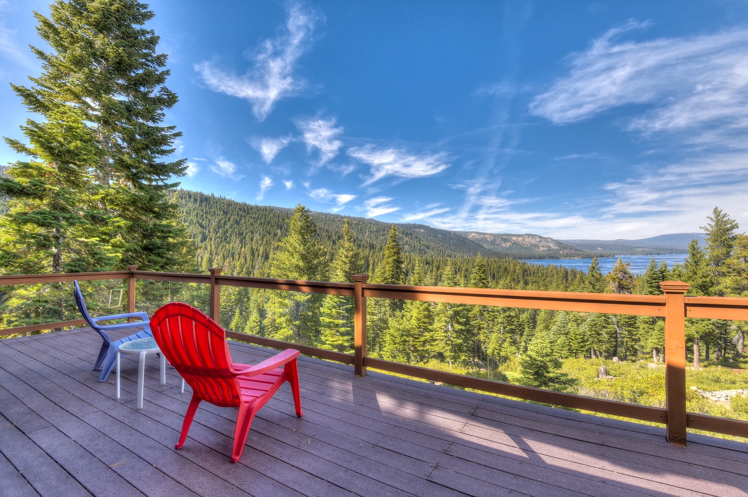 Relax on the private balcony with a lake view
