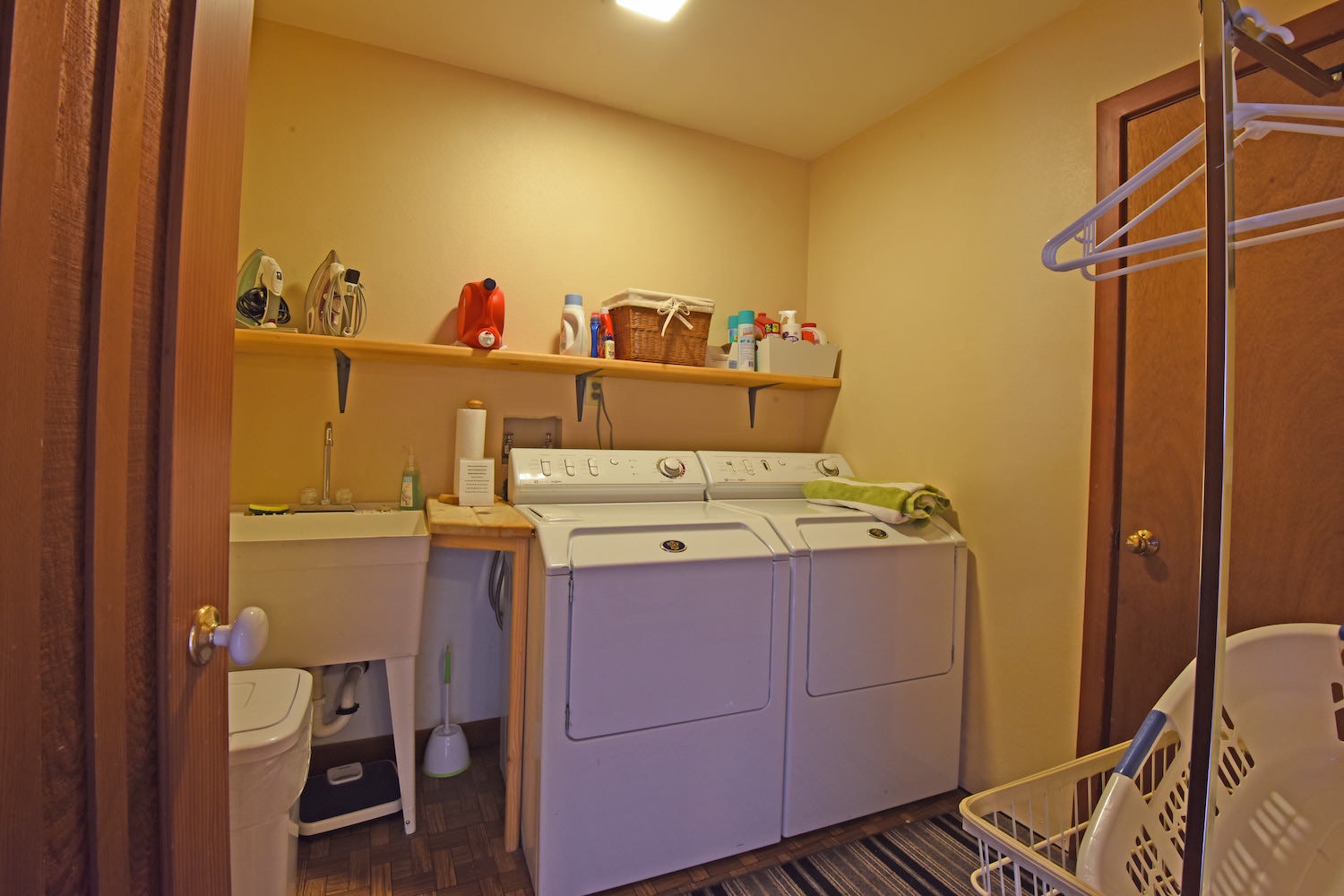Private laundry room w/ washer and dryer