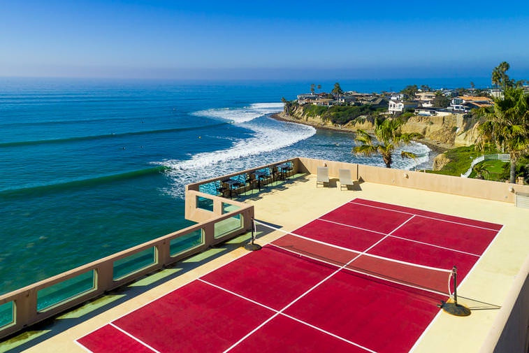 Rooftop tennis court overlooking the ocean