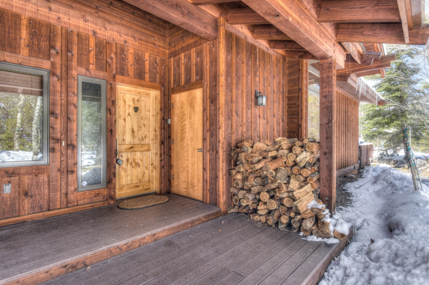 Covered entryway with firewood