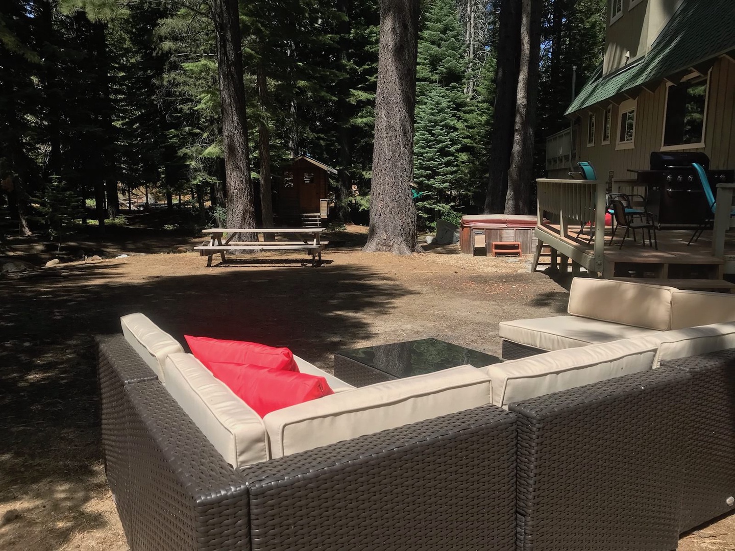 Backyard with hot tub & patio seating