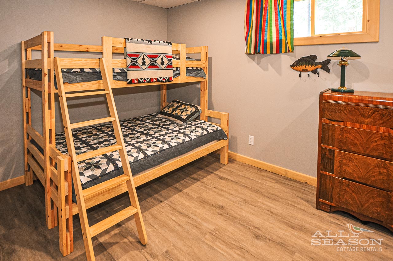 Flagstone_Lower level bedroom with double/single bunk and Queen