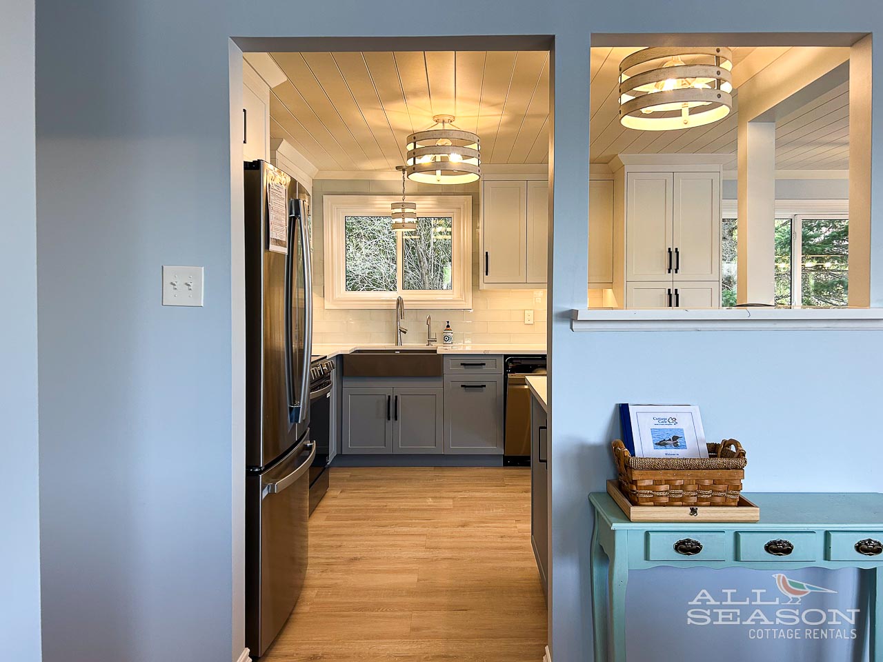 Step into your fully equipped kitchen with modern appliances and stylish pendant lighting, perfect for preparing meals during your stay.