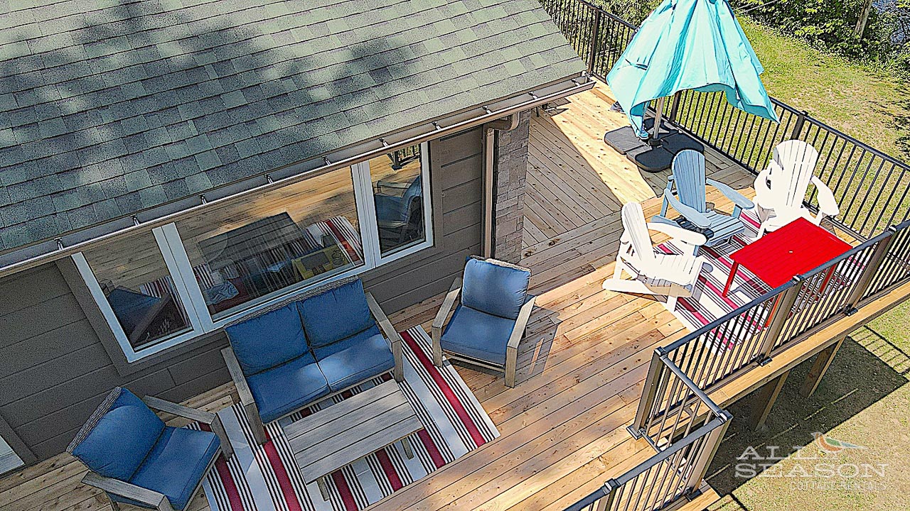 Unwind on your private deck with cozy seating and panoramic views—perfect for morning coffee or evening gatherings.