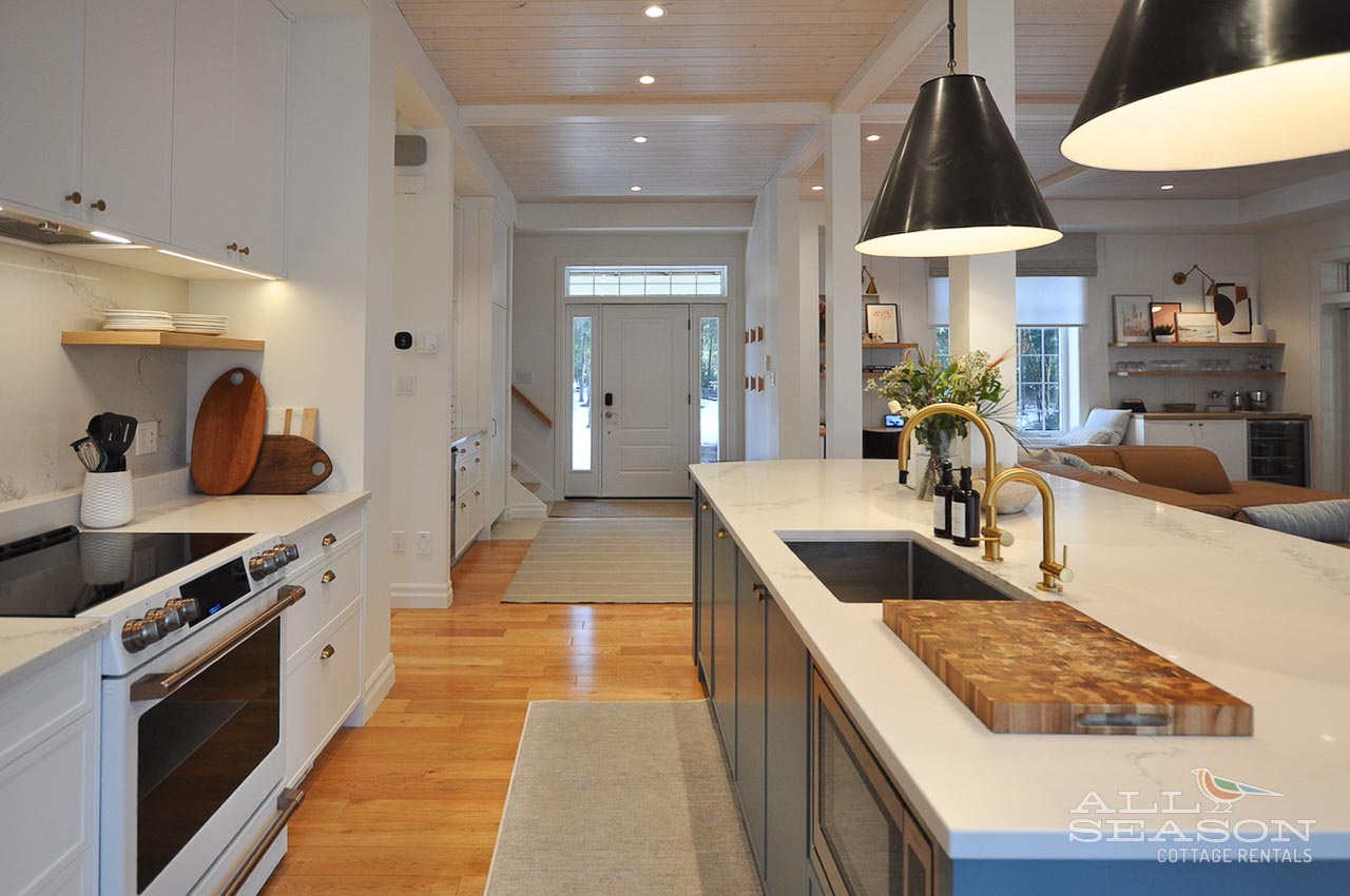 Your gourmet kitchen awaits with gleaming countertops, premium appliances, and ample space for cooking memorable meals together.