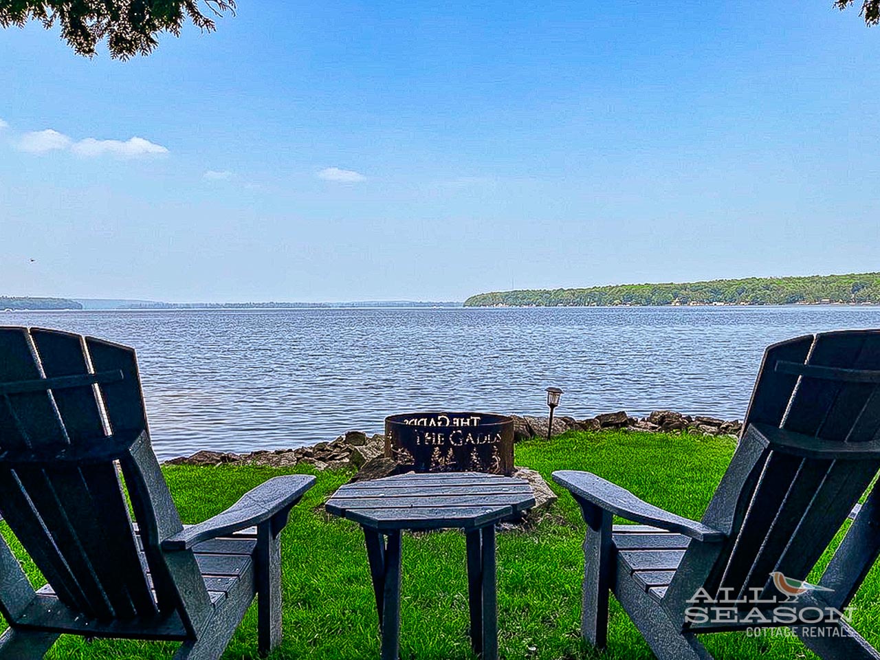 Settle into these Adirondack chairs and soak up stunning lake views from your private waterfront lawn.
