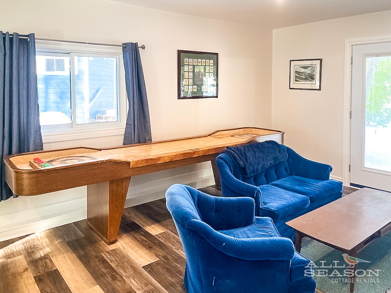 Unwind in your game room with shuffleboard and plush seating - perfect for friendly competition and relaxing evenings together.