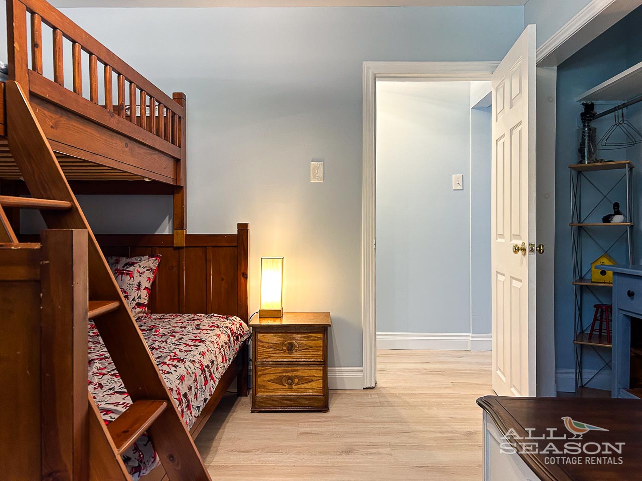 Your kids will love this cozy bunk room with warm wood furniture and soft lighting for bedtime stories.