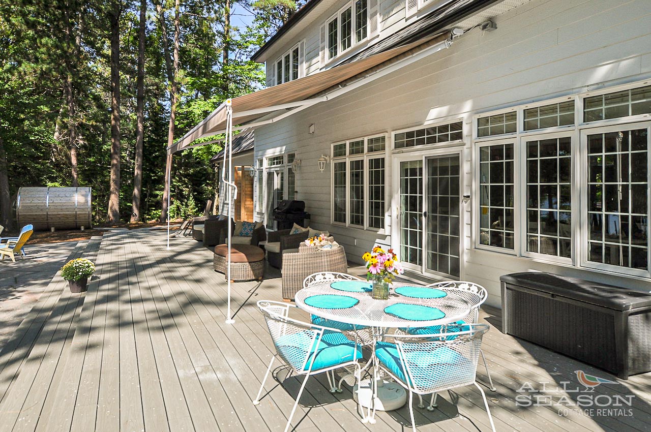 Step onto your private deck where morning coffee and al fresco meals await among towering trees and dappled sunlight.