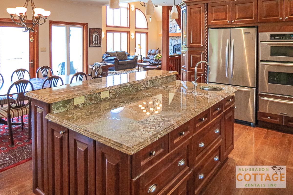 Kitchen island towards dining area and livingroom