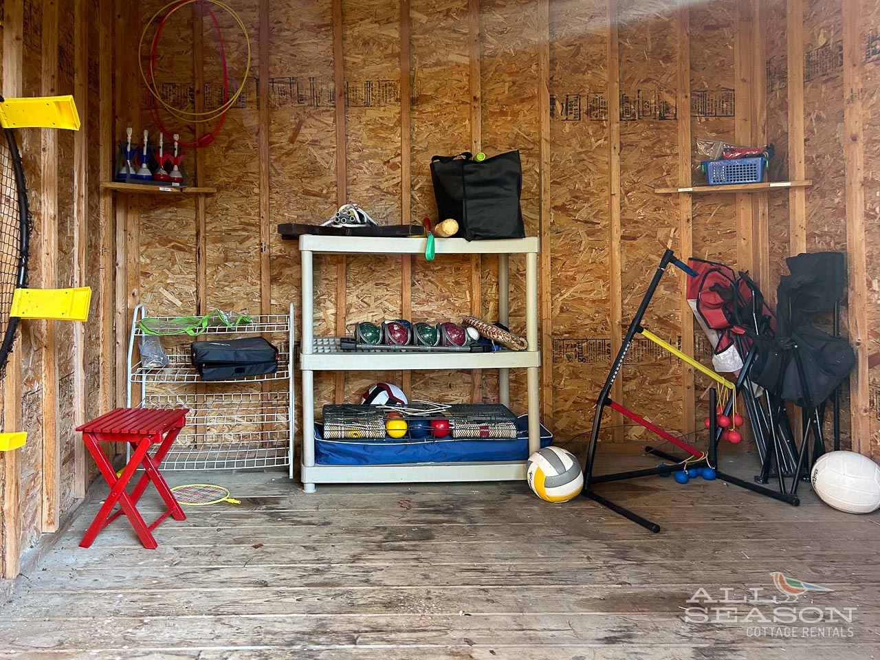Your private game garage awaits with basketball hoops, volleyballs, and sports gear ready for active fun with friends and family.