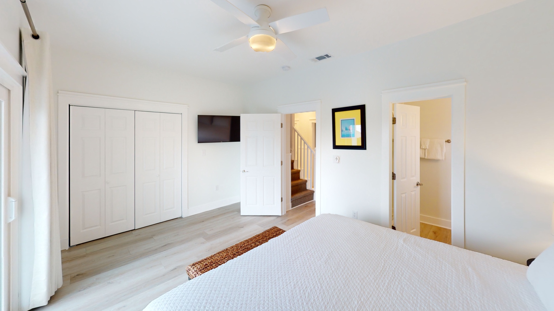 Bedroom 6 is equipped with a ceiling fan, TV and a private bathroom
