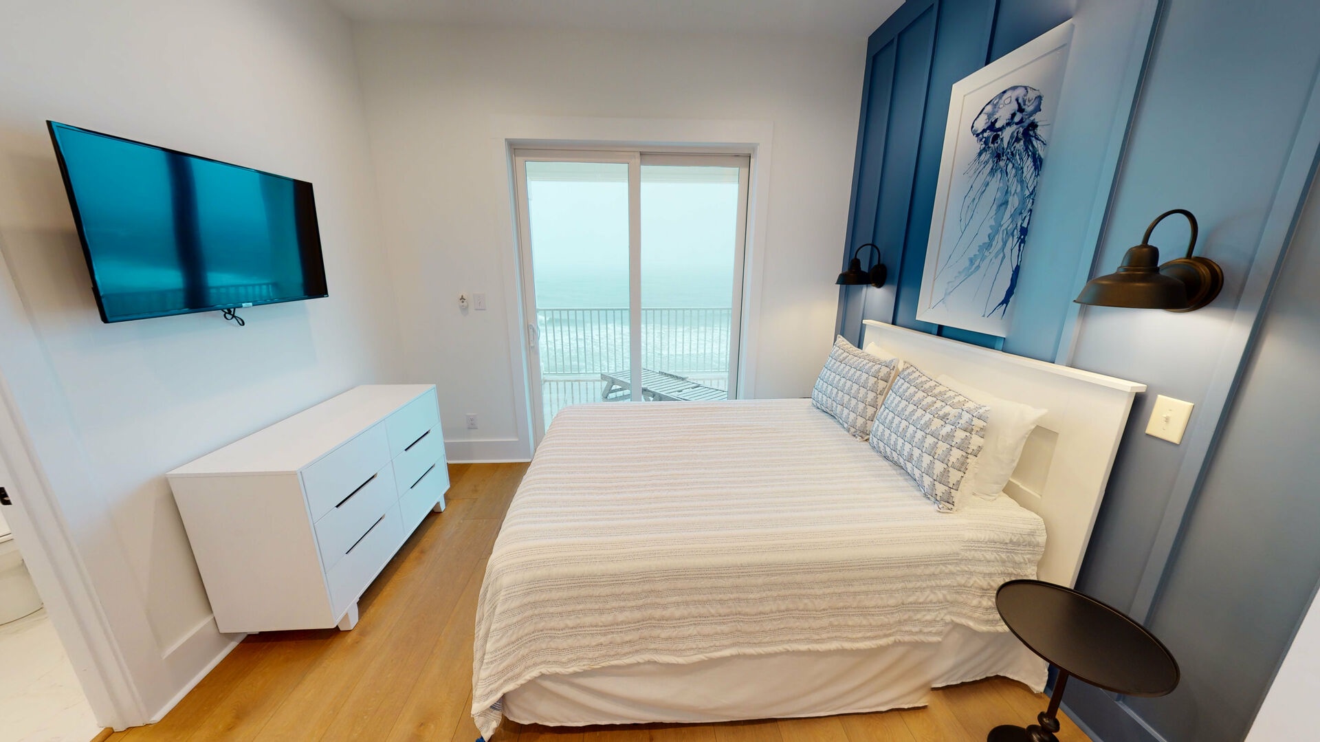 Bedroom #4 is on the 3rd floor with a queen bed, TV, private bathroom, Gulf views and balcony access