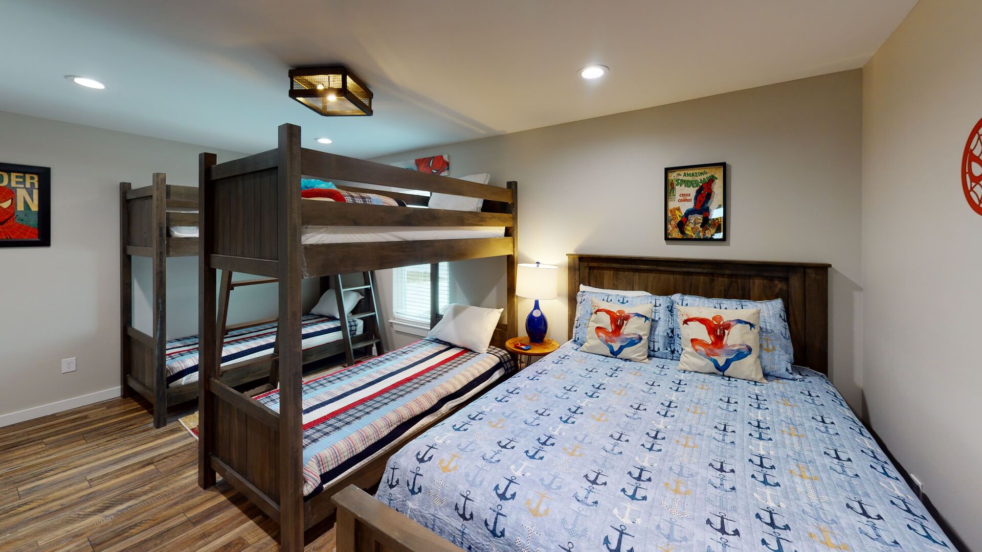 Bedroom #4 or "the bunk room" contains 2 twin bunks and a queen bed. The room is located on the 1st floor