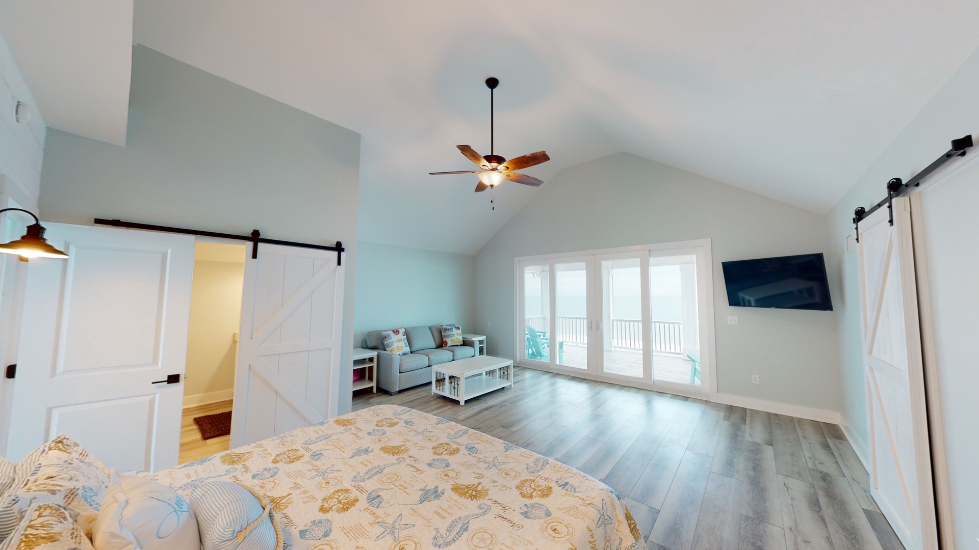 3rd floor Master bedroom with a king bed, TV and ceiling fan