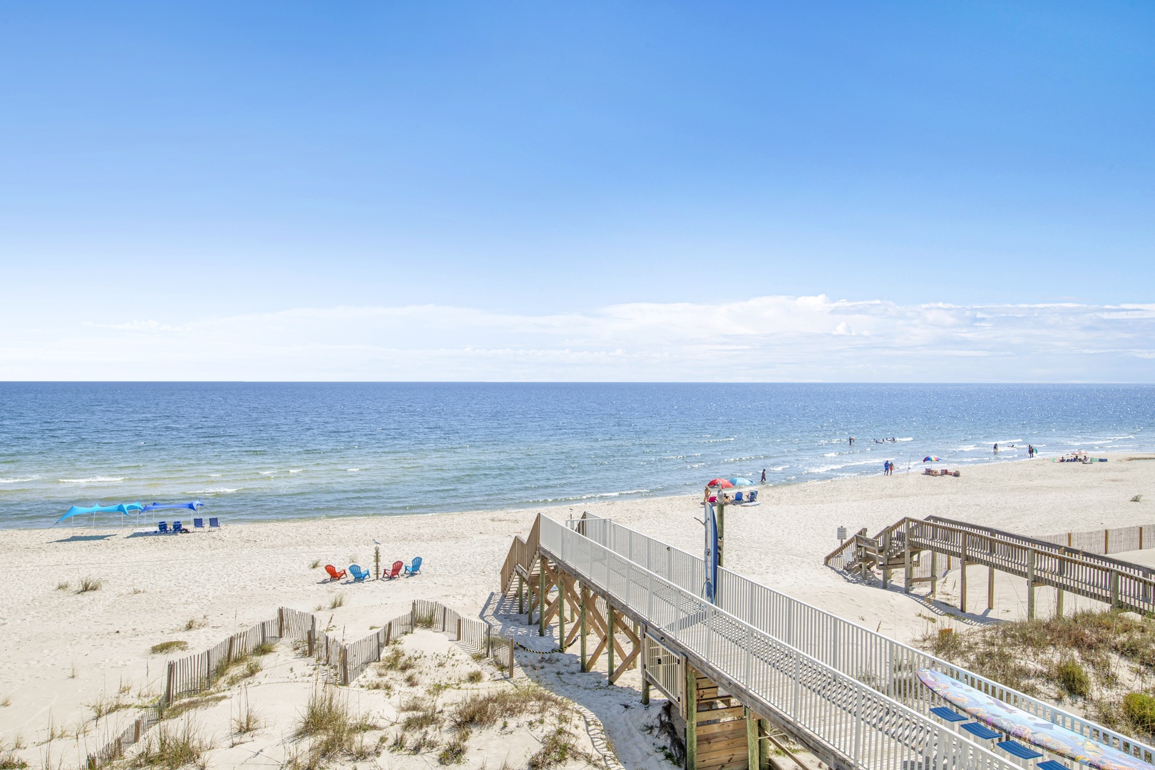 Private beach boardwalk at this direct beachfront home