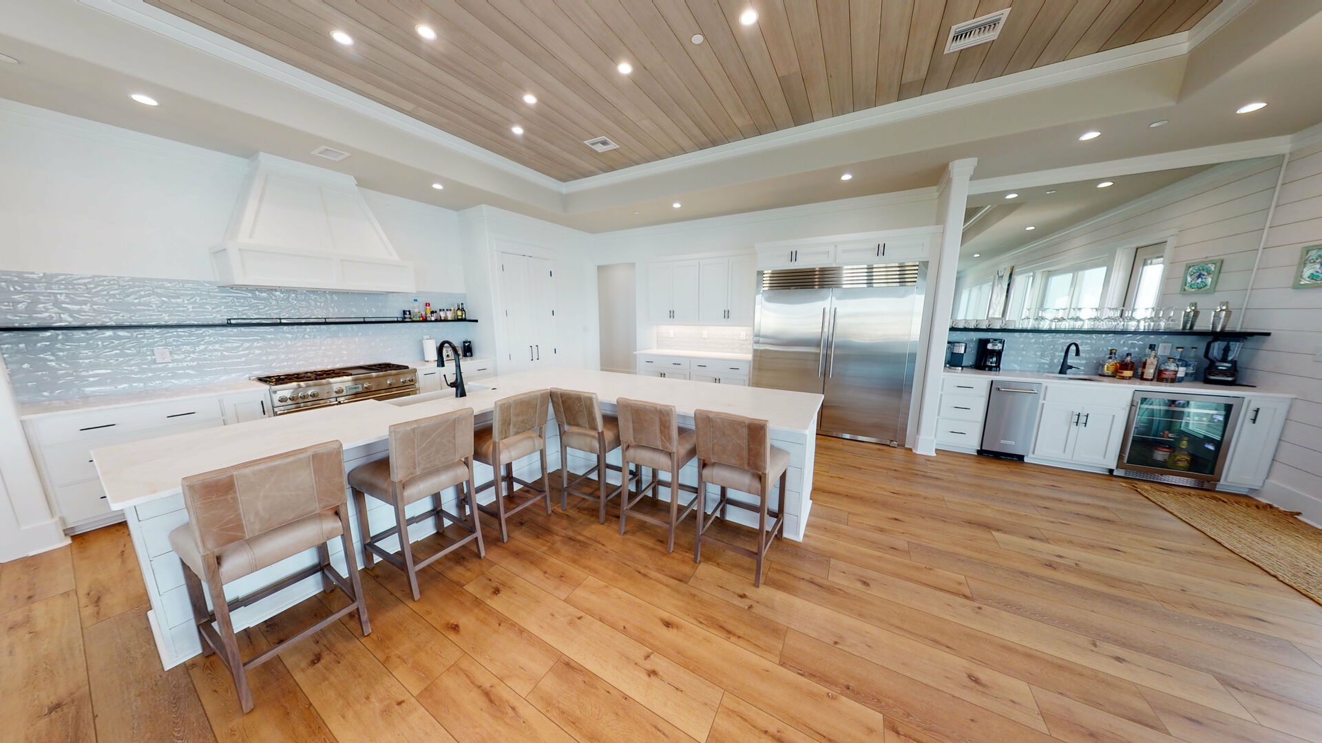 There is additional seating at the island in the beautiful designer kitchen