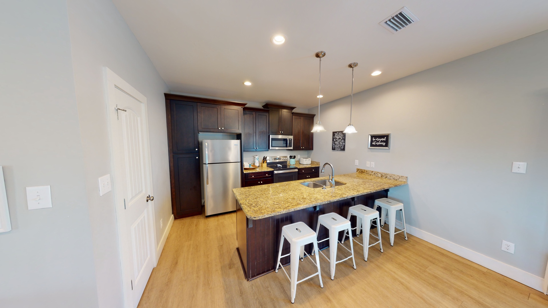 Fully equipped kitchen; island seating for 4
