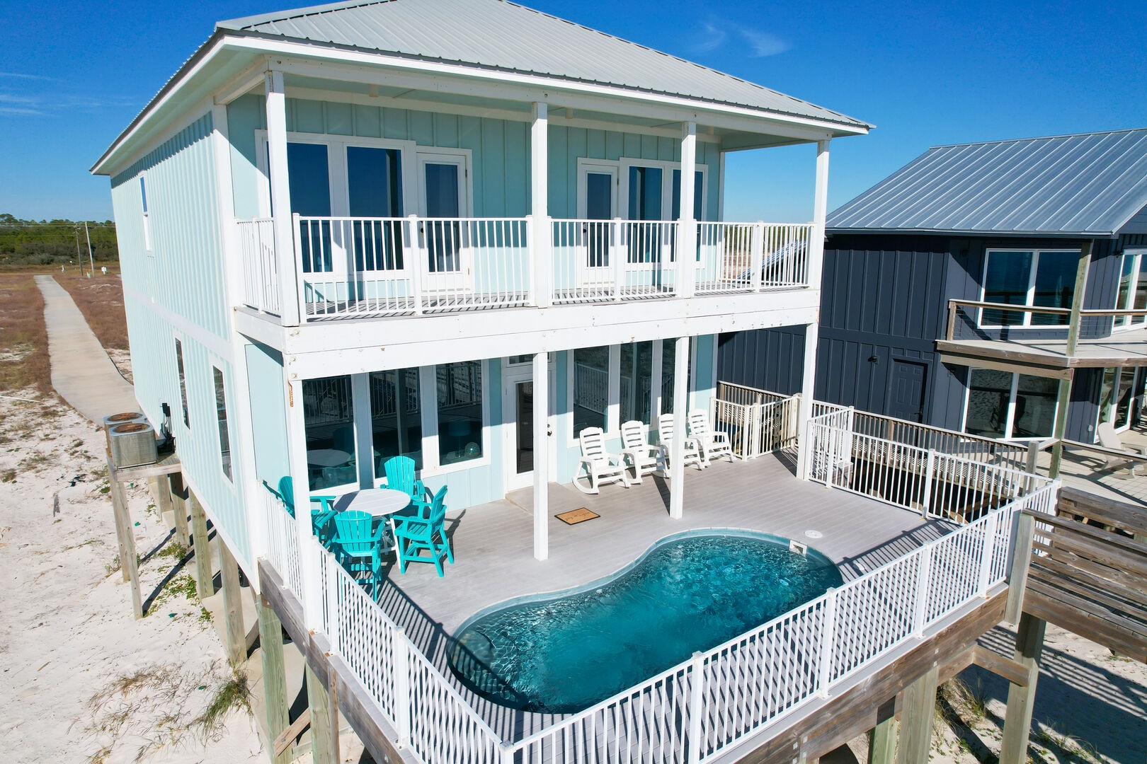 Perfect for large family getaways! Beachside pool deck and covered seating