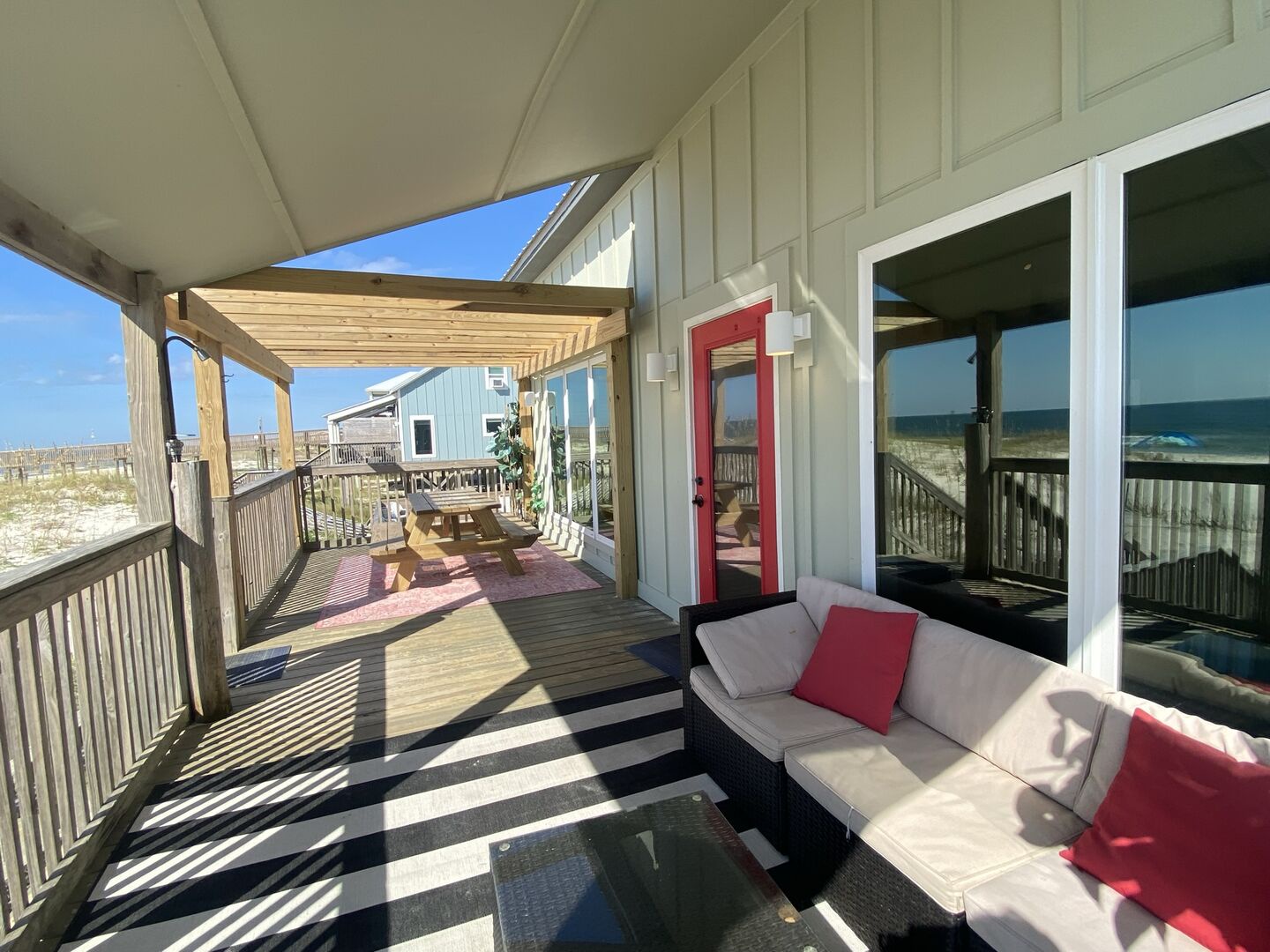 Wings has a wonderful pergola as well as covered porch area facing the Gulf